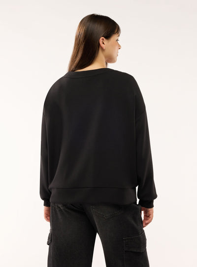 Felpa oversize con scollo a v