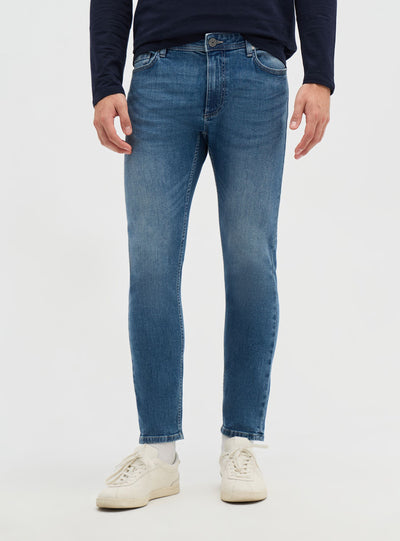 Jeans skinny a tinta unita