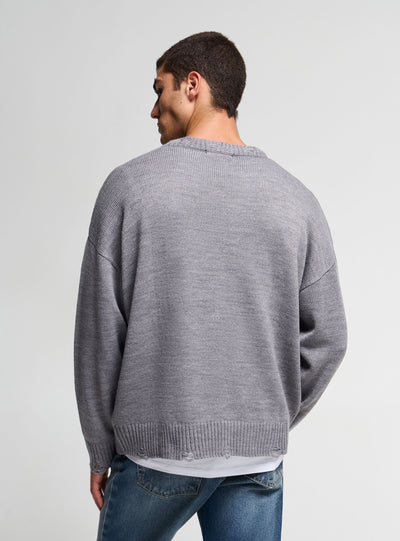 Maglia boxy con strappi