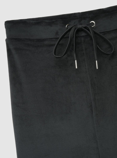 Pantaloni tuta a zampa ciniglia tinta unita