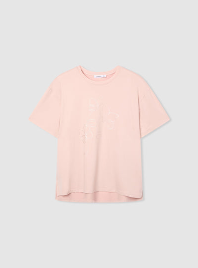 T-shirt con stampa volto e farfalle