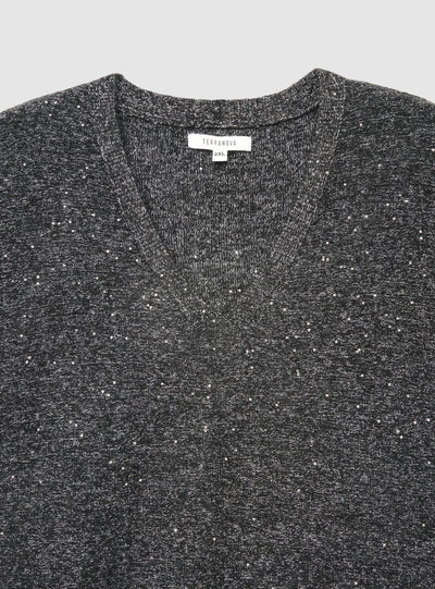 Maglia con paillettes e scollo a V