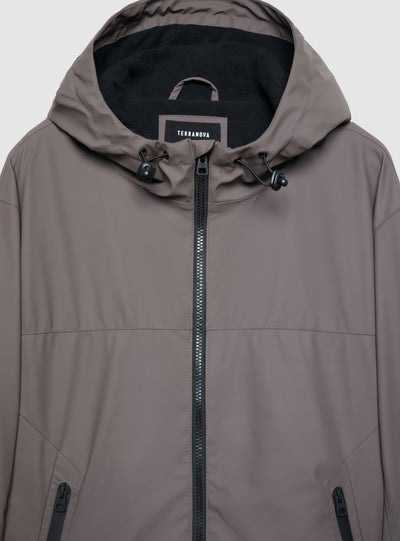 Giacca a vento con cappuccio e zip