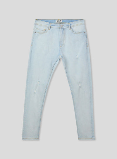 Light skinny jeans with rips
