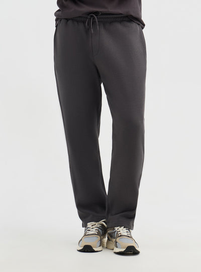 Pantaloni tuta relaxed a tinta unita