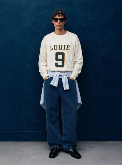 Sweatshirt with embroidered lettering and number