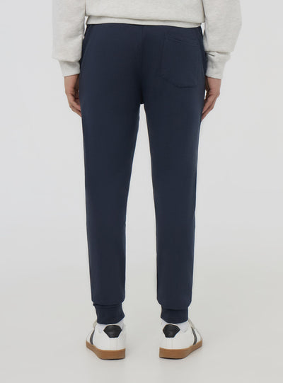 Pantaloni tuta leggeri skinny con polsini