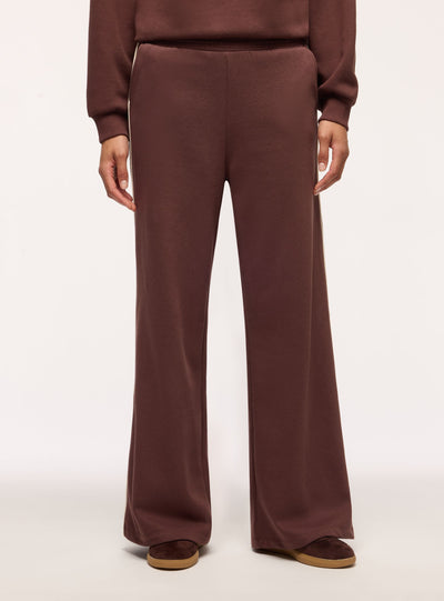 Pantaloni tuta maxi con piping laterale