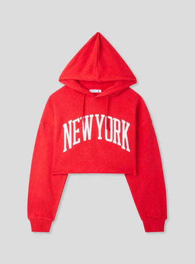 Felpa crop con cappuccio e stampa New York