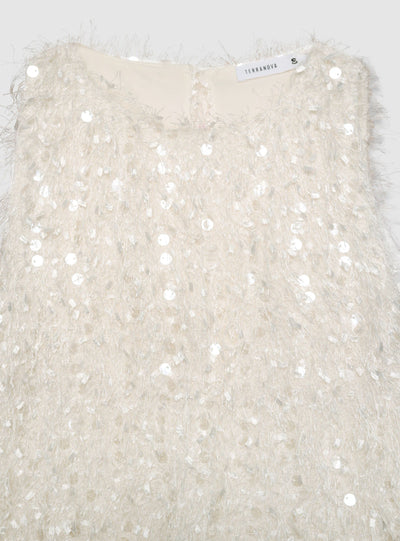 Top con paillettes e effetto piumette