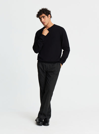Pantaloni chino con pinces gessati