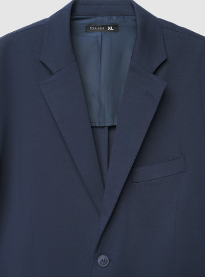 Veste unie à simple boutonnage