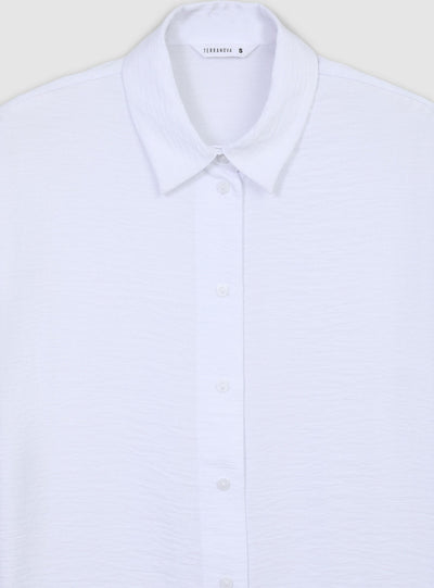 Camicia con maniche ad aletta tessuto leggero