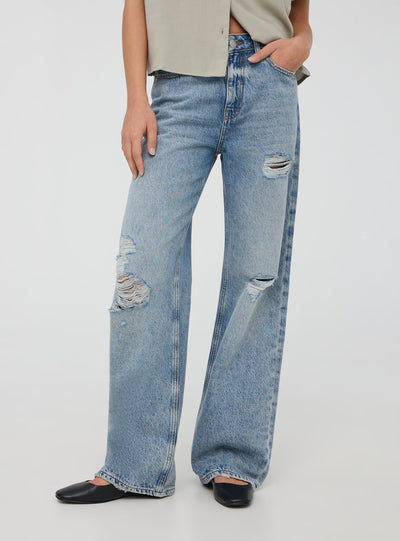Jeans wide leg con strappi acid wash
