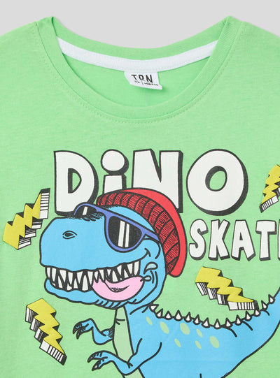 T-shirt stampa dinosauro e skateboard