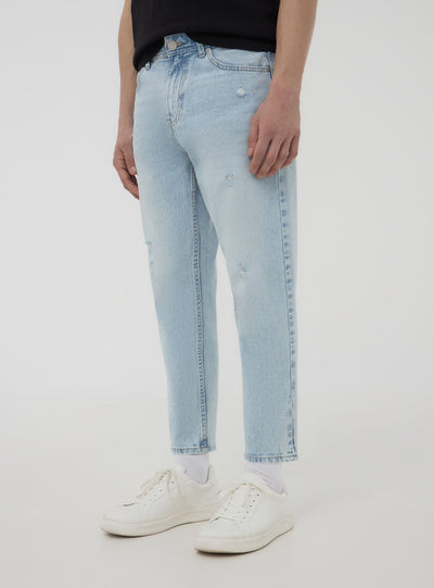 Loose fit jeans with small rips