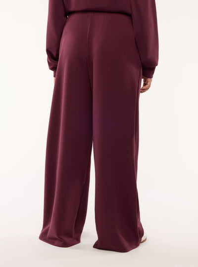Pantaloni tuta wide leg a tinta unita