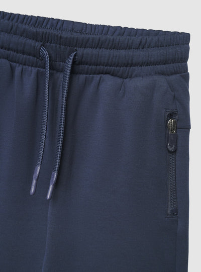 Pantaloni tuta jogger con zip e coulisse