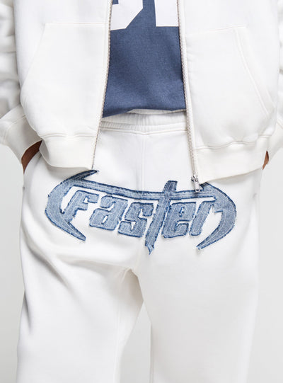 Pantaloni tuta wide leg con patch ricamata