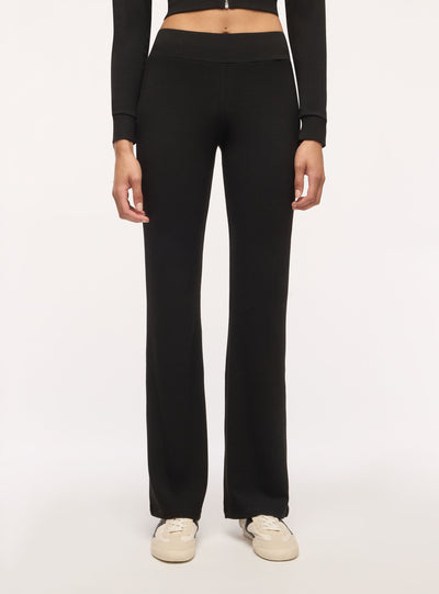 Leggings lunghi a zampa tinta unita