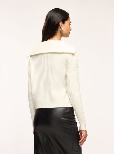 Maglia a coste con zip al collo