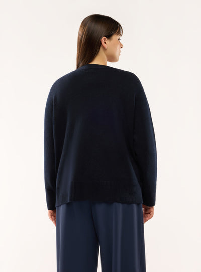 Maglia con scollo a V e bottoni laterali