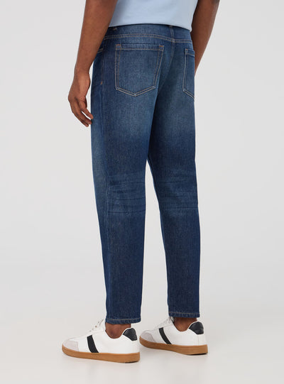 Jeans scuri relaxed cinque tasche