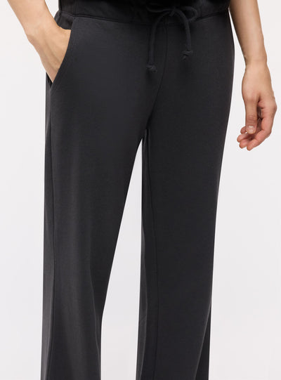 Pantaloni tuta ampi a zampa con coulisse