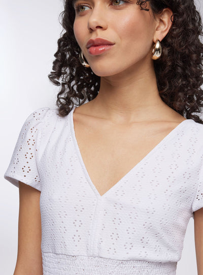 Blusa crop in sangallo
