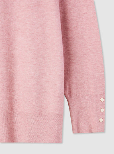 Plain-colour jumper with buttons at the cuffs