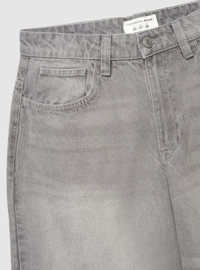 Jeans barrel con fibbia sul retro