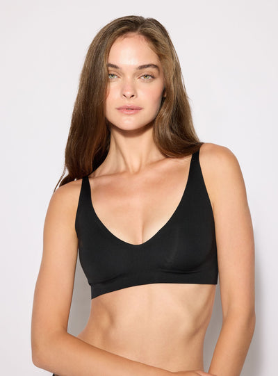 Reggiseno top taglio vivo a tinta unita