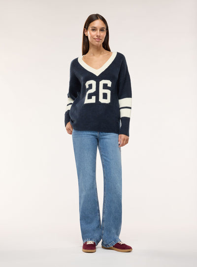 Maglia con scollo a V e numero intarsiato