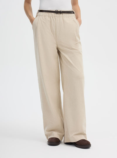 Pantaloni wide leg in velluto con cintura