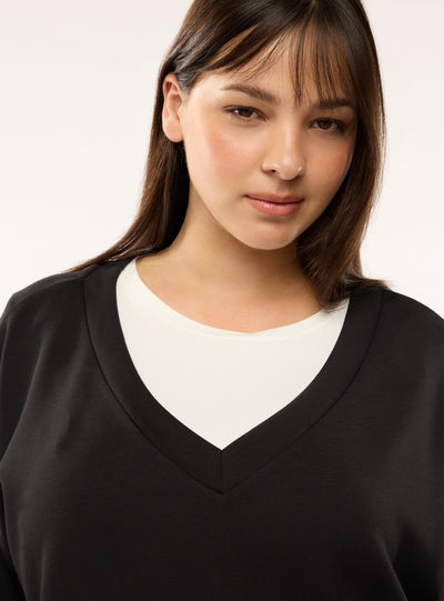 Felpa oversize con scollo a v