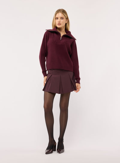 Maglia a coste con zip al collo