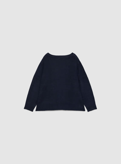 Maglia con scollo a V e bottoni laterali