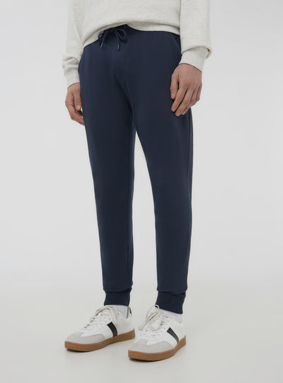 Pantaloni tuta leggeri skinny con polsini