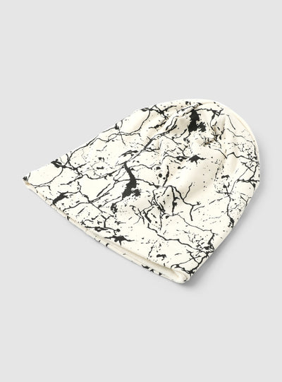Cap with marbled print