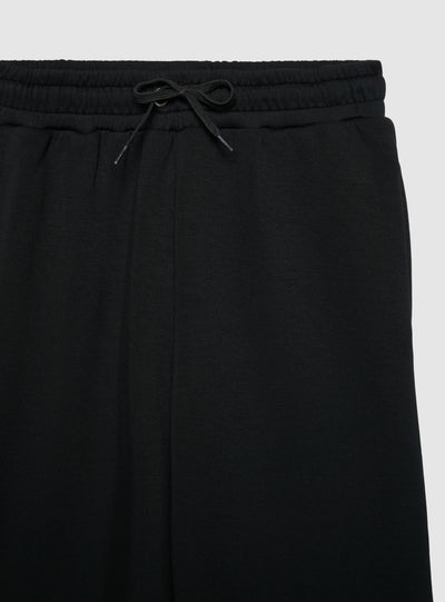 Pantaloni tuta maxi a tinta unita con coulisse