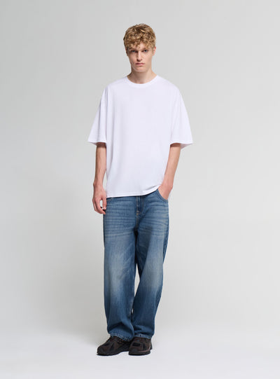 T-shirt over a tinta unita