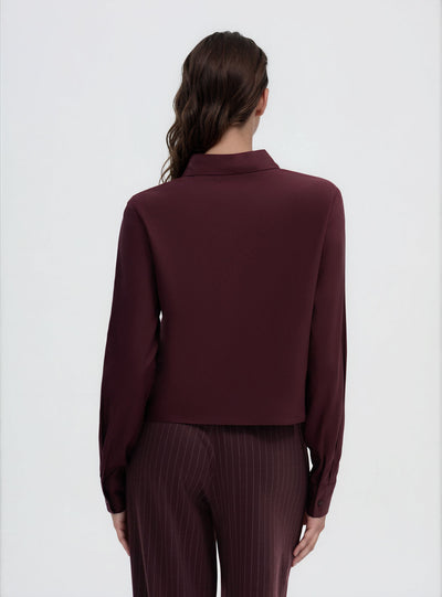 Camicia crop a tinta unita