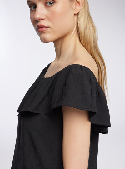 Blusa spalle scoperte con balza