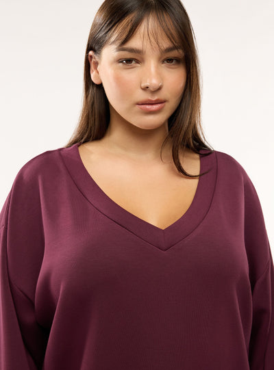 Felpa oversize con scollo a v