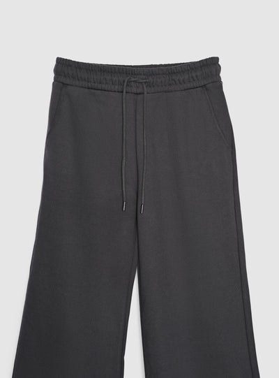 Pantaloni tuta maxi con coulisse a tinta unita