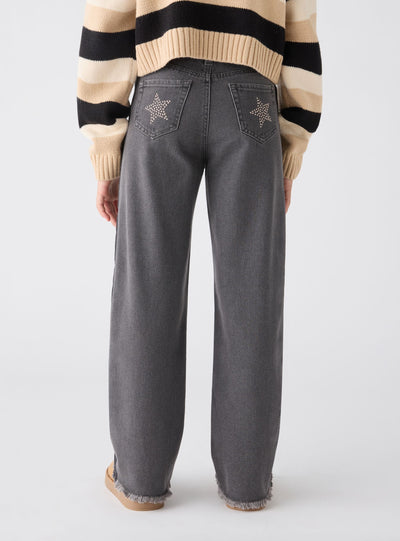 Jeans wide leg con stelle di borchie