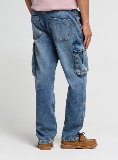 Jeans cargo over a tinta unita