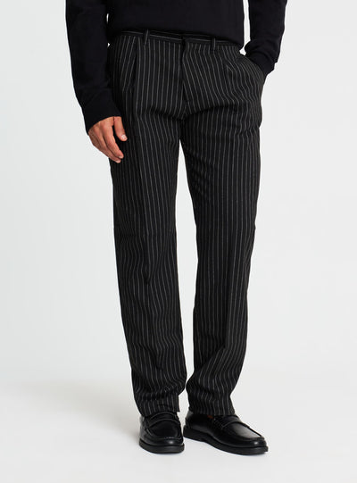 Pantaloni chino con pinces gessati