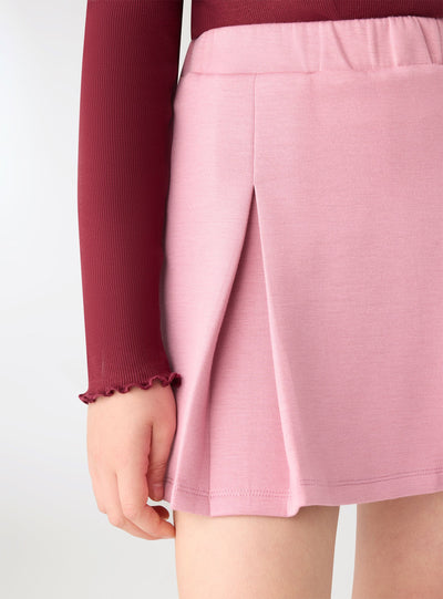 Skort da bambina con pieghe a tinta unita