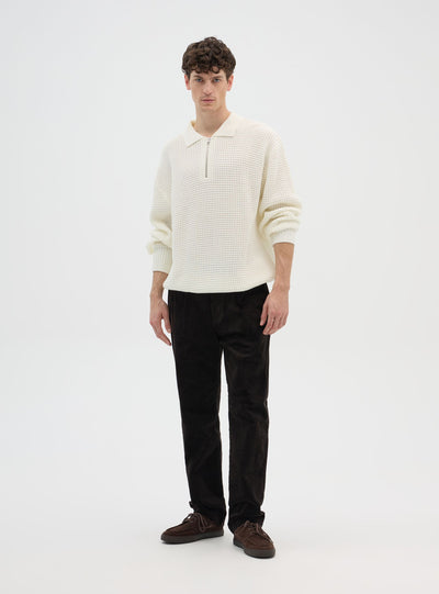 Maglia polo con zip e punto mosso